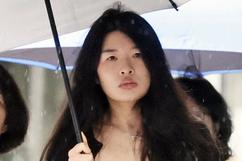 Singaporean woman fined for passing gin to driver after car crash to interfere with breathalyser test