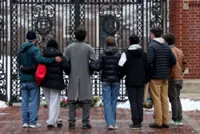 Manhunt for Brown University shooter renewed after police release detained man