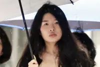 Singaporean woman fined for passing gin to driver after car crash to interfere with breathalyser test