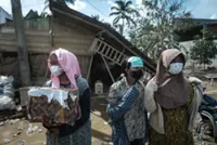 'The city was gone': Survivors recount flood chaos during rare cyclone in Indonesia