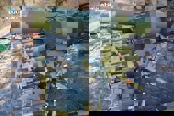 Thai troops seize large cache of Cambodian weapons on Hill 500