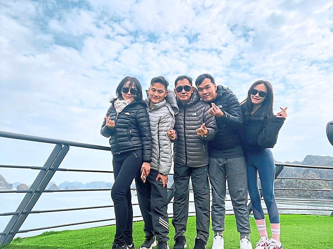 Challenges remain, but time together still brings Lim (far left) and her family joy and laughter.