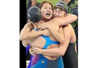 Swimmer sets new national mark, and will now turn journalist