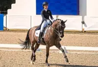 Teen sensation storms to historic Games dressage gold