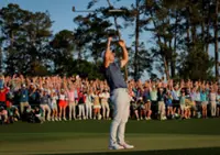 Golf-McIlroy joins elite club with Masters win, Scheffler dominates majors
