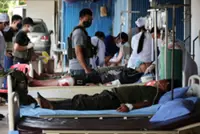 From hospital beds, Cambodian soldiers describe 'toxic gas'