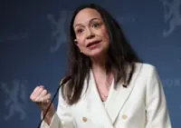 Nobel Peace laureate Machado doing well despite injured back, no longer in Oslo