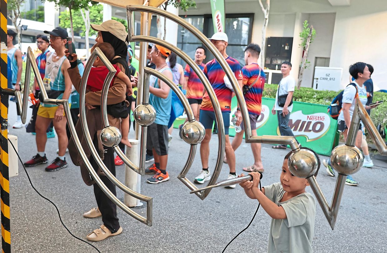 Visitors enjoying a game as part of activities at PBIM 2025. — Photos: ZHAFARAN NASIB/The Star