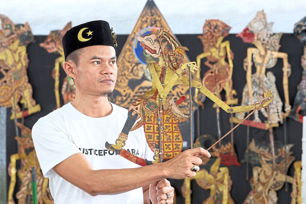 The four-day festival at Dataran Bandaraya Johor Baru features Johor’s culture and arts including shadow puppets, as exhibited by puppeteer Hafizal Hashim from Muar Parit Bugis Javanese Association.