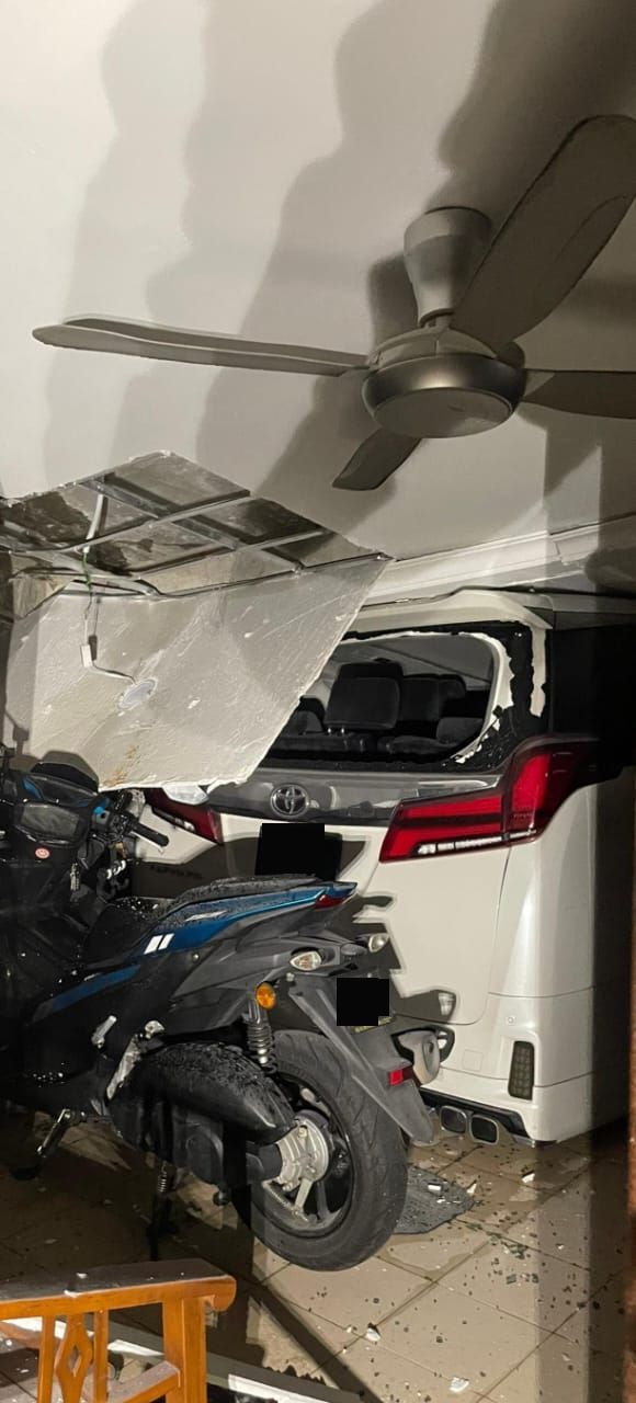 Two vehicles and a motorcycle were damaged in the incident.