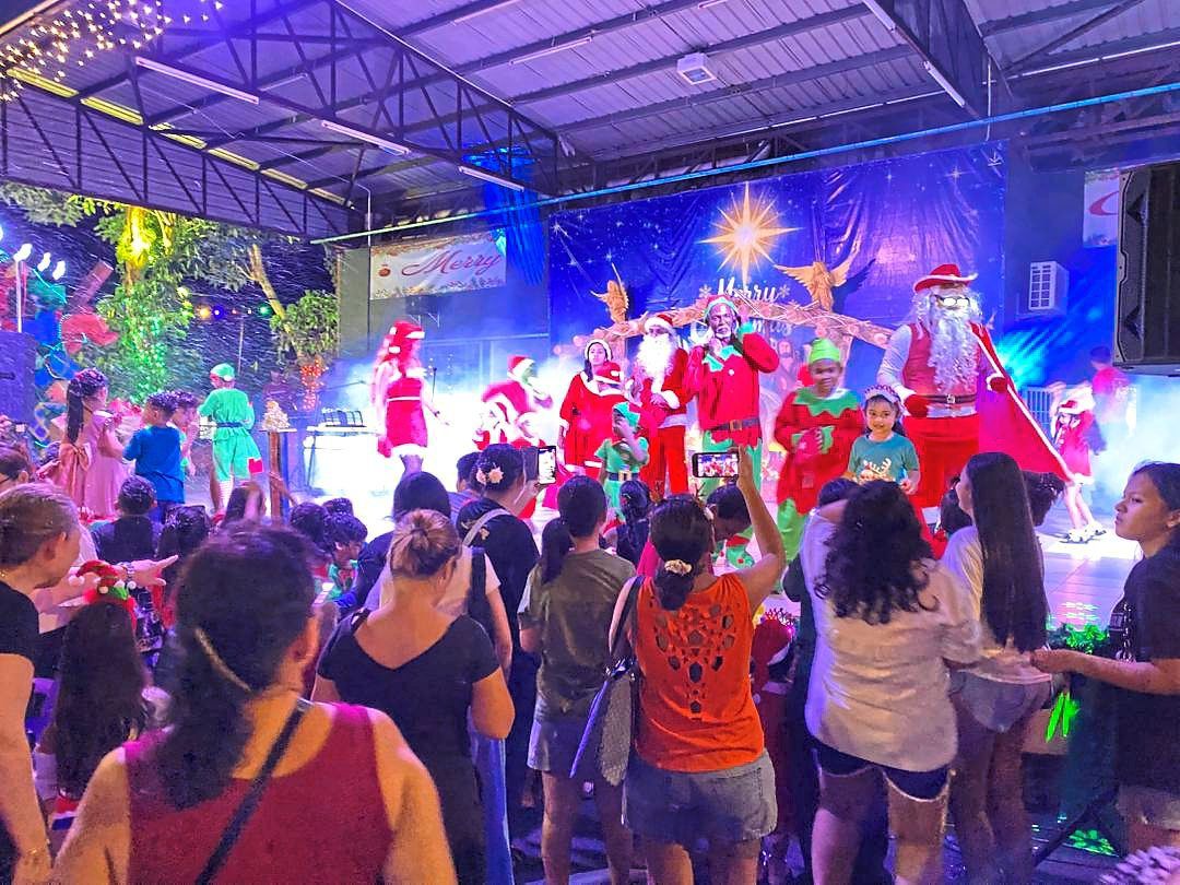 Festive cheer fills the Settlement Square as families and children gather for the Portuguese Settlement’s annual Christmas celebration. Photo: Joanne Sequerah