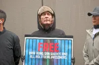 Junta says Suu Kyi in good health after her son raises alarm