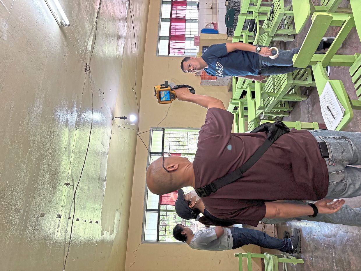 Volunteers deployed by the Ayala Foundation taking part in back-to-school repair and clean-up operations under the Brigadang Ayala Balik Eskwela programme in June 2025. (Photo courtesy of Ayala Corporation)