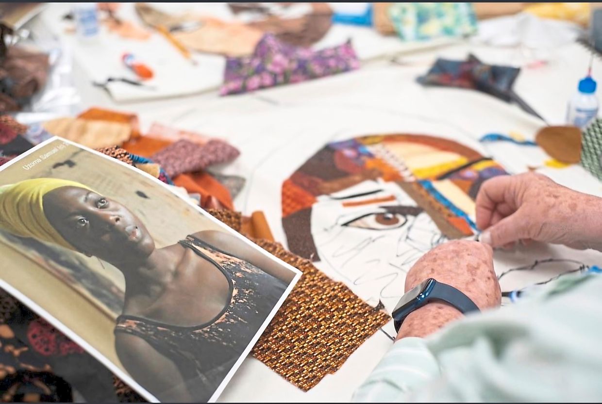 At the academy, adults with disabilities turn recycled materials into portrait art.