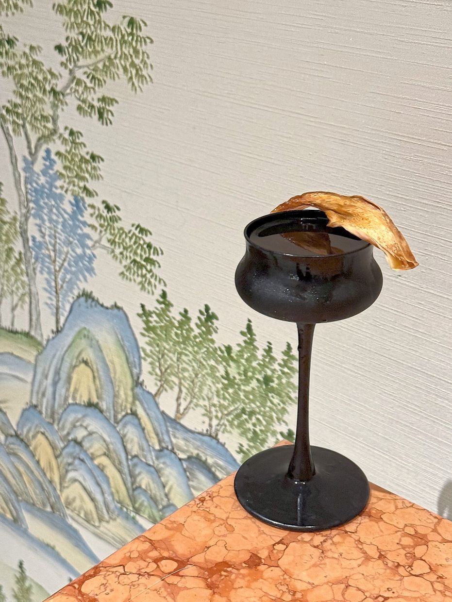 The Magic Manhattan combines a medley of locall-foraged mushrooms for an earthy, umami-filled twist of a classic.