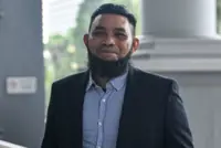 Papagomo charged with failure to notify business changes concerning public donations