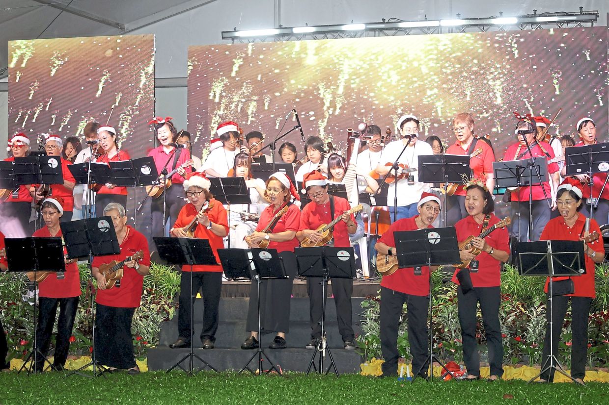 A local church group singing carols during the celebration at St George’s Church. 