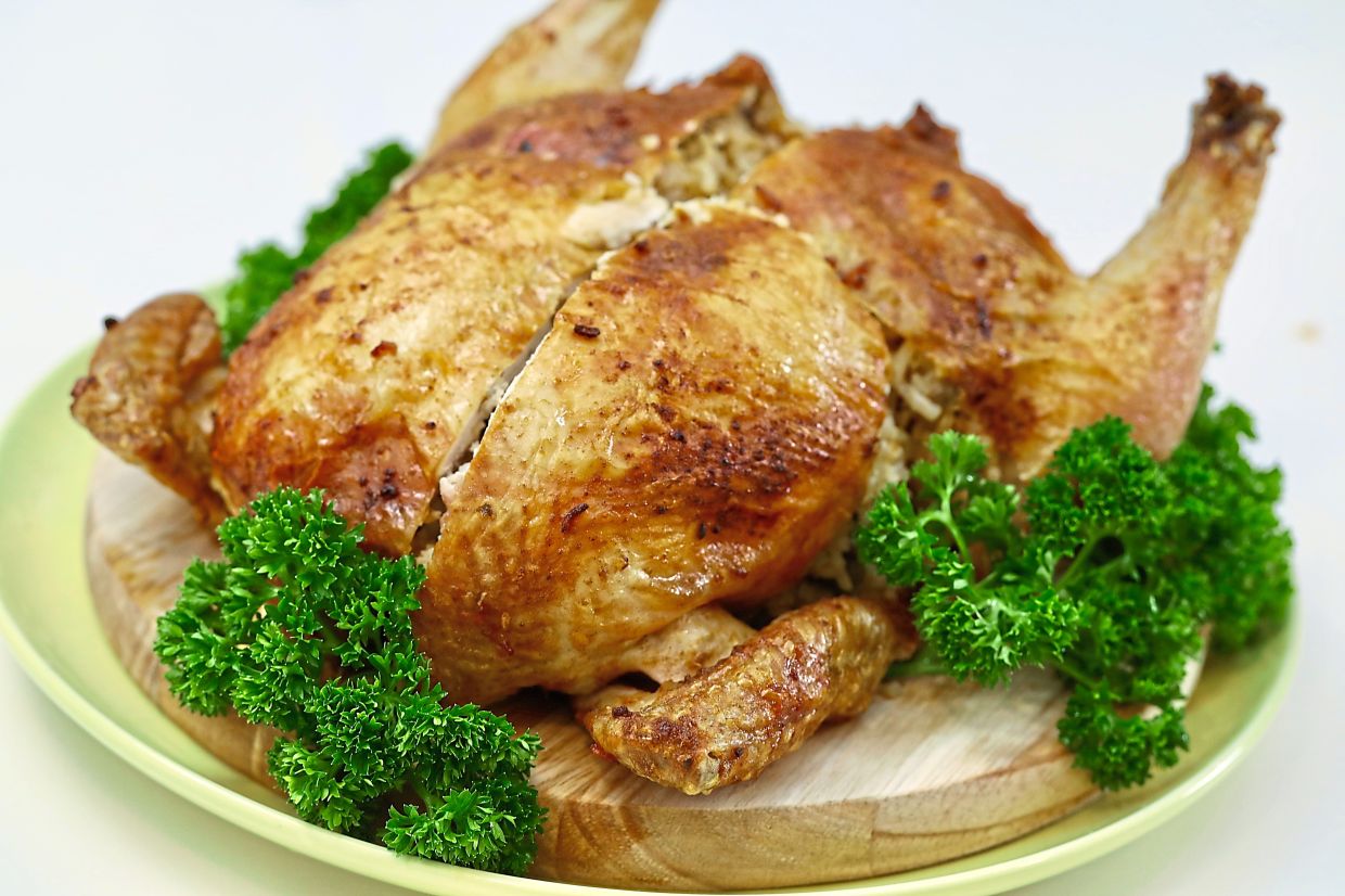 Portuguese baked chicken rice. — LOW LAY PHON/The Star