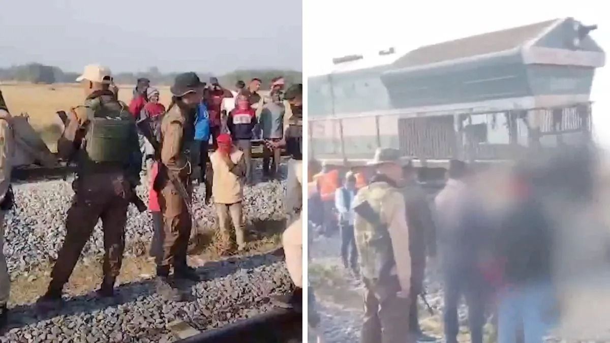 Security personnel and railway officials at the site after the Sairang–New Delhi Rajdhani Express hit a herd of elephants in Hojai district, causing the derailment of a few coaches, on Saturday. - Photo: ANI video grab