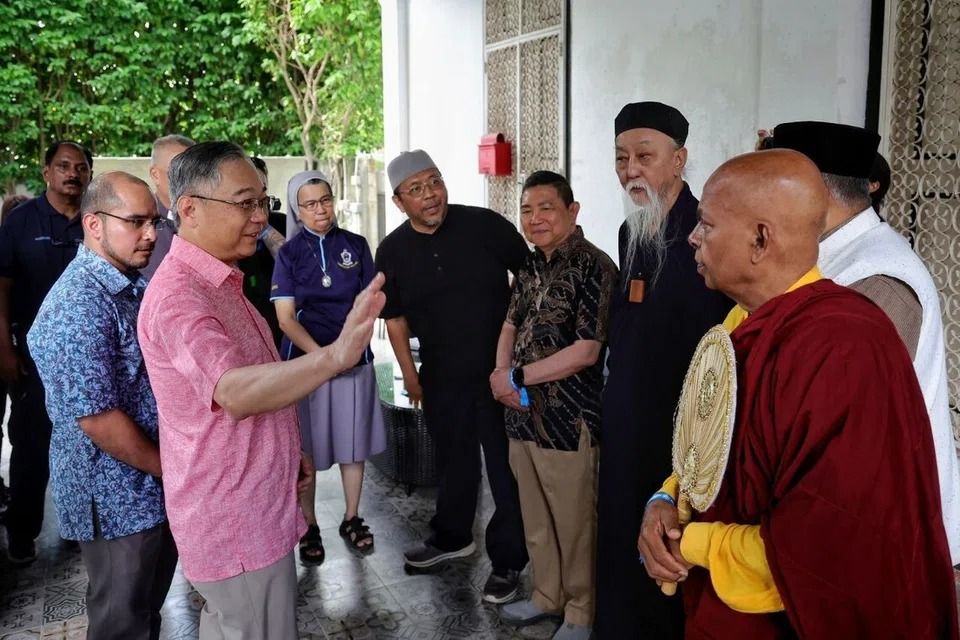 Deputy Prime Minister Gan Kim Yong interacting with interfaith religious leaders during the fund-raising event on Dec 20. - Photo: ST