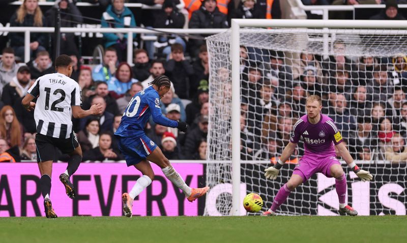 Soccer-Newcastle squander two-goal lead in thrilling 2-2 draw with Chelsea