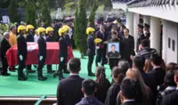 Fallen firefighter honoured in funeral procession as Hongkongers gather to pay tribute