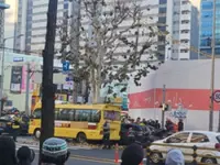 Woman in 60s dies after car crashes into hagwon bus in western Seoul; six injured