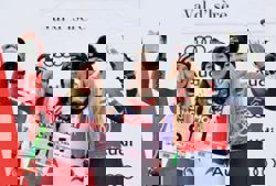 Alpine skiing-Huetter clinches first World Cup win of season, Vonn finishes third