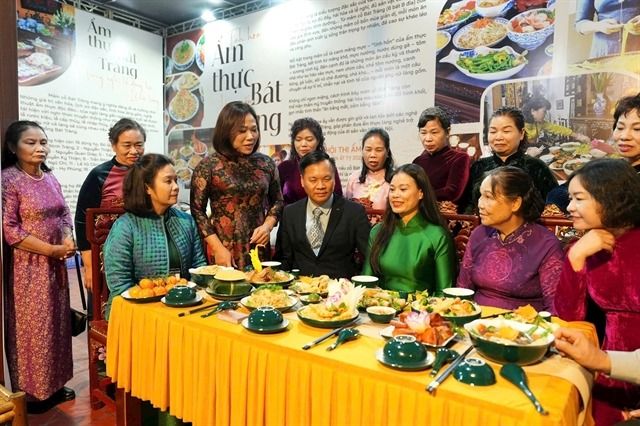 A typical Bat Trang feast is displayed at the event. - VN