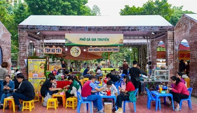 Visitors enjoying pho, the symbolic dish of Hanoi and Vietnam at the Hanoi Culinary Culture Festival 2025. - Courtesy of organisers