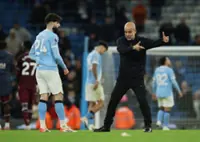 Soccer-'Merry Christmas but it's not enough,' Man City boss tells league leading team