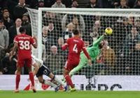 Soccer-Isak on target but injured as Liverpool hang on to defeat Tottenham