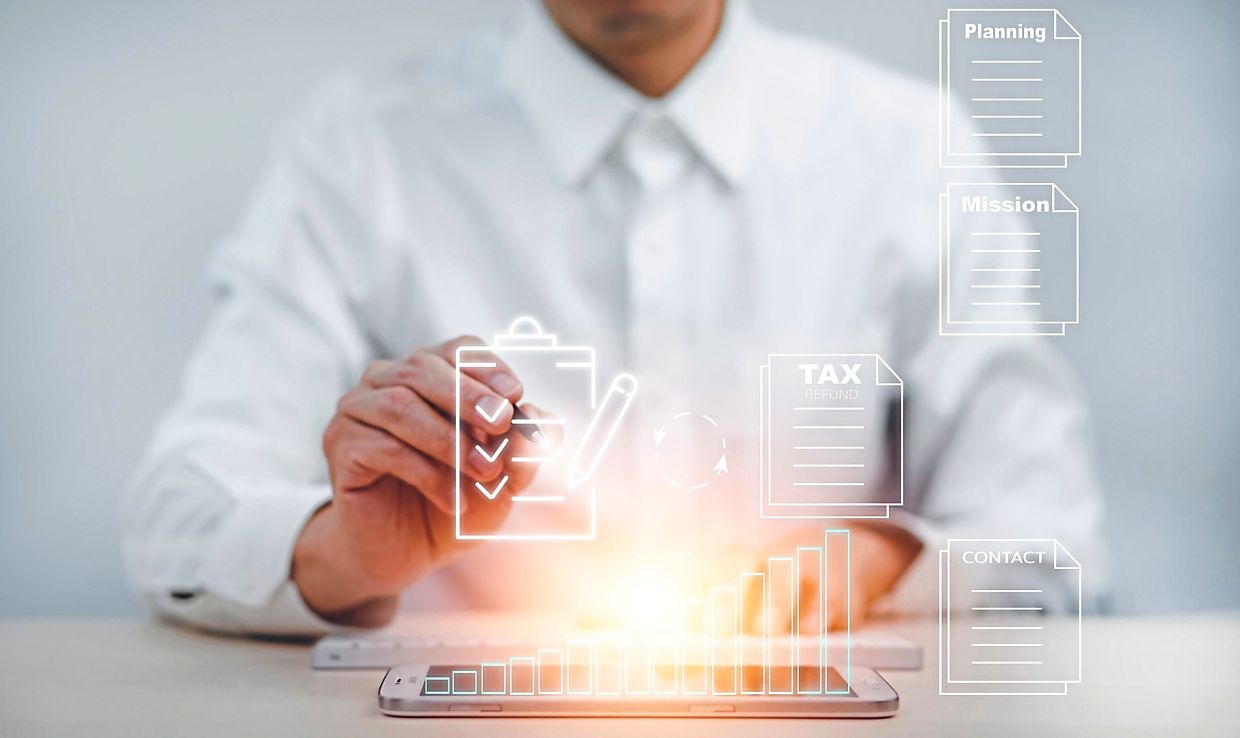 MODERNISING MALAYSIA’S TAX SYSTEM