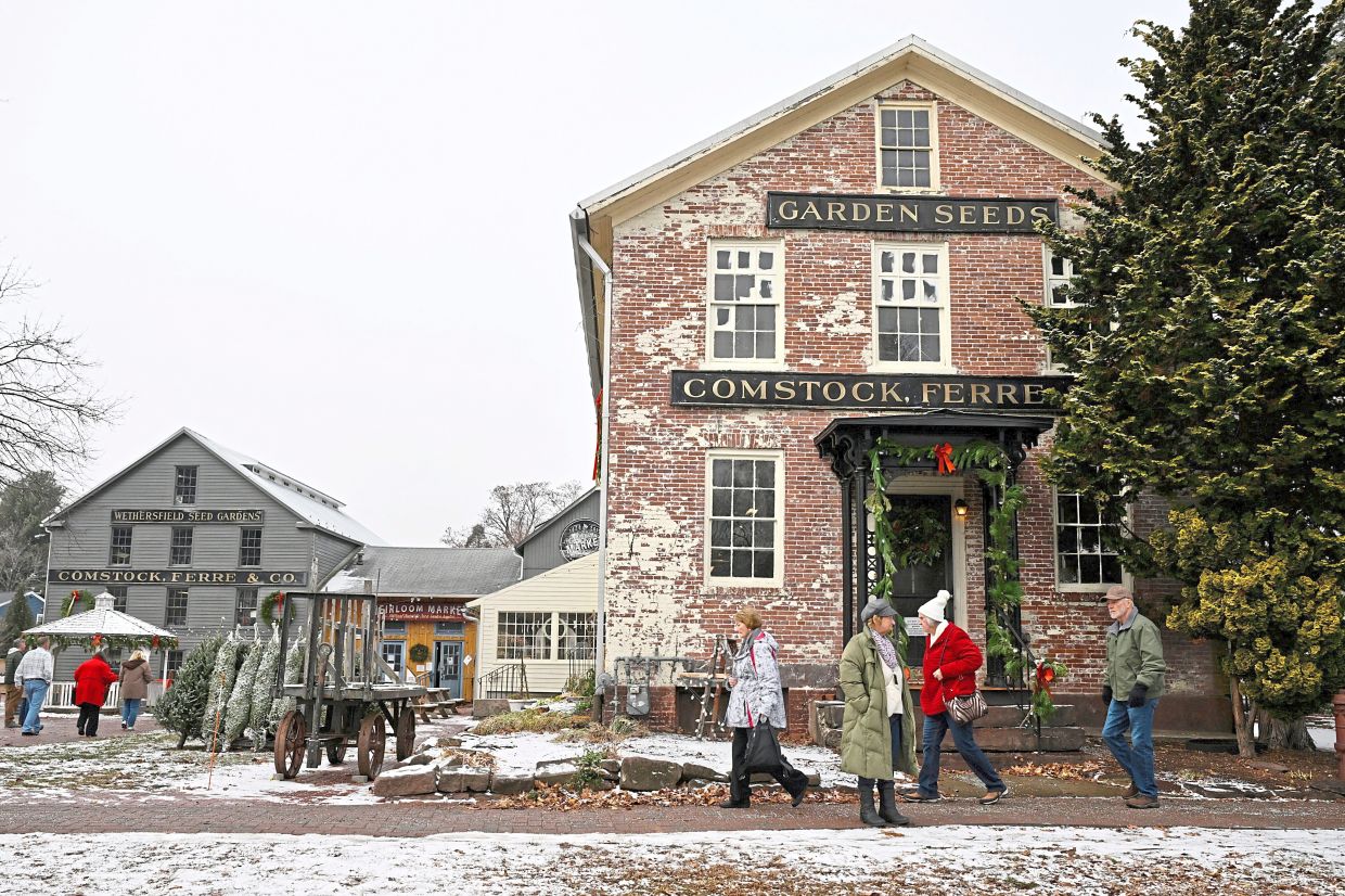 Tourists on a week-long Hallmark Movie Christmas Tour at Heirloom Market, where Christmas On Honeysuckle Lane and Rediscovering Christmas were shot.