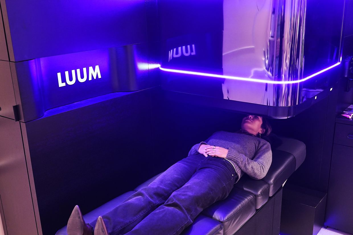 Pictured here is a robot that does lashes, at a Nordstrom department store in New York. Photo: AP