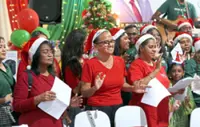 Carollers, parade light up Sentul despite drizzle