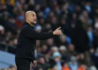 Soccer-Guardiola tells Man City players to go easy on Christmas dinner
