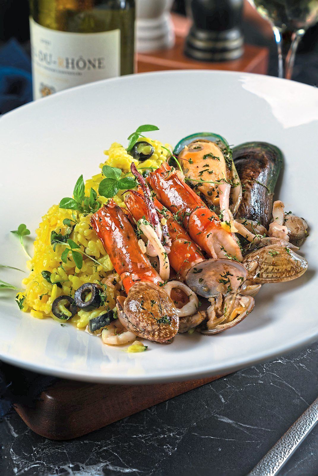 The saffron risotto is cooked to perfection and retains an opulent edge varnished with aquatic leanings. — D Empire