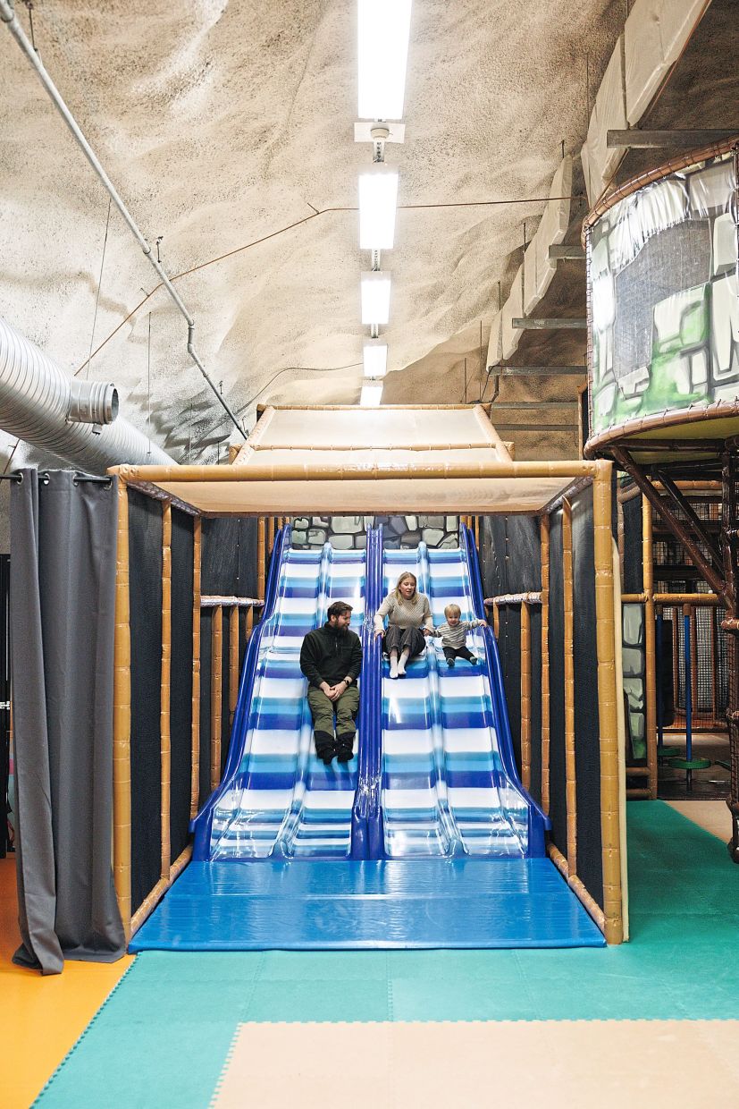 Itakeskus, a popular underground swimming hall in Helsinki. — Photos: VESA LAITINEN/The New York Times Slides at an underground children’s playground.