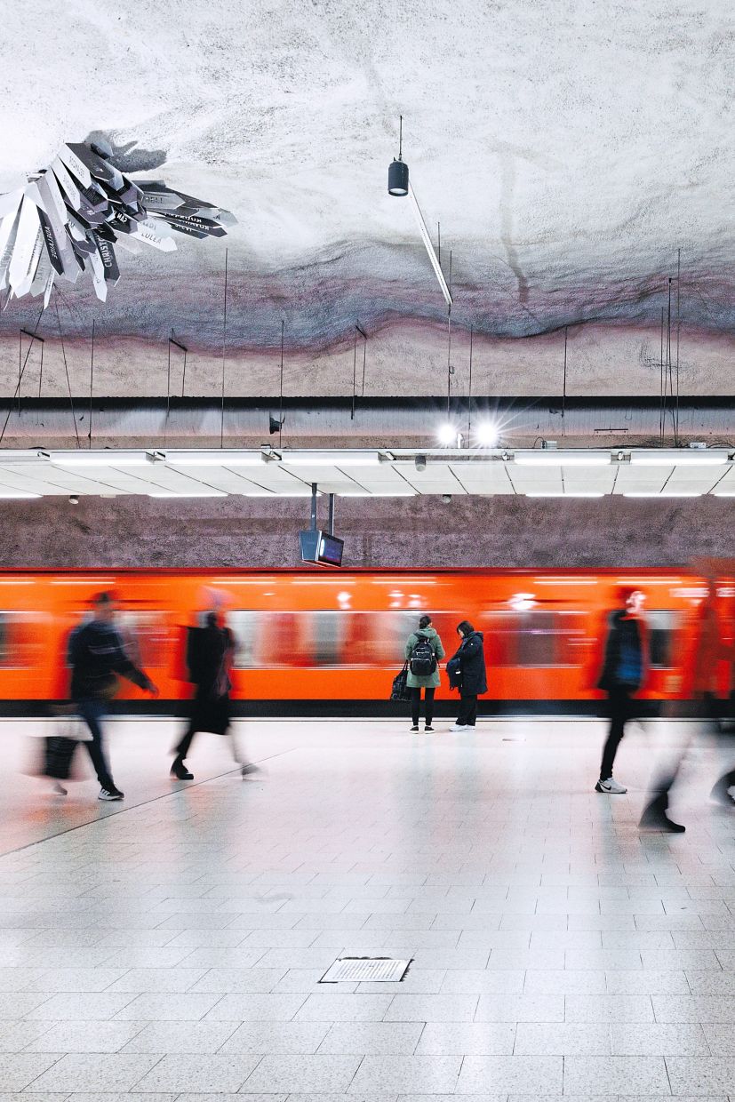 Commuters at the underground Kamppi metro station.