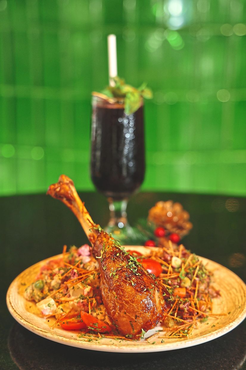 In Aldana's family, relatives will usually pile their plates with slices of turkey as well as other additions like Arabic rice, Russian salad and a glass of Chicha Morada. — AZMAN GHANI/The Star