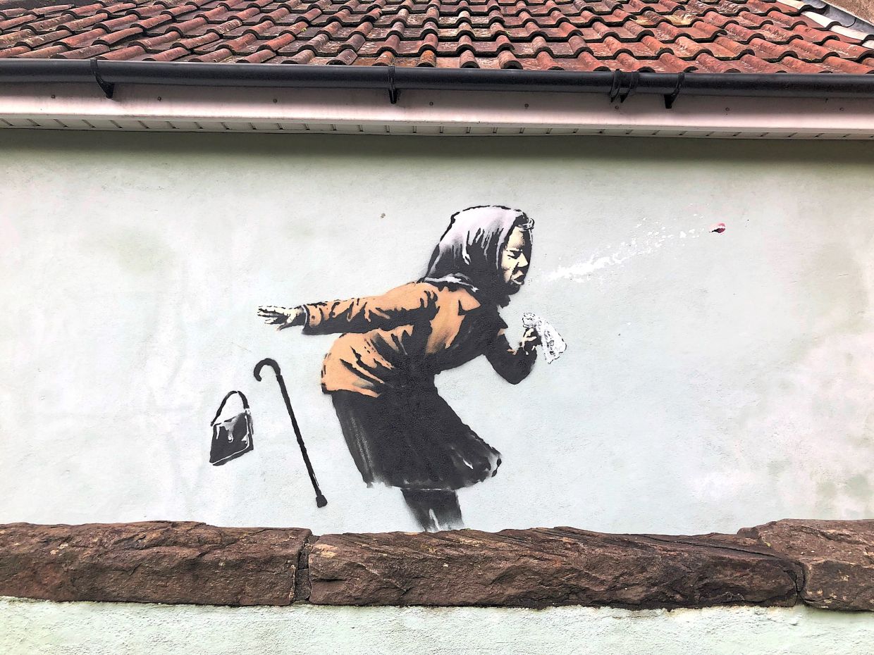 Graffiti that has appeared on a wall in Vale Street, Bristol, one of the cities in Europe worth exploring next year. — CLAIRE HAYHURST/PA Wire/dpa