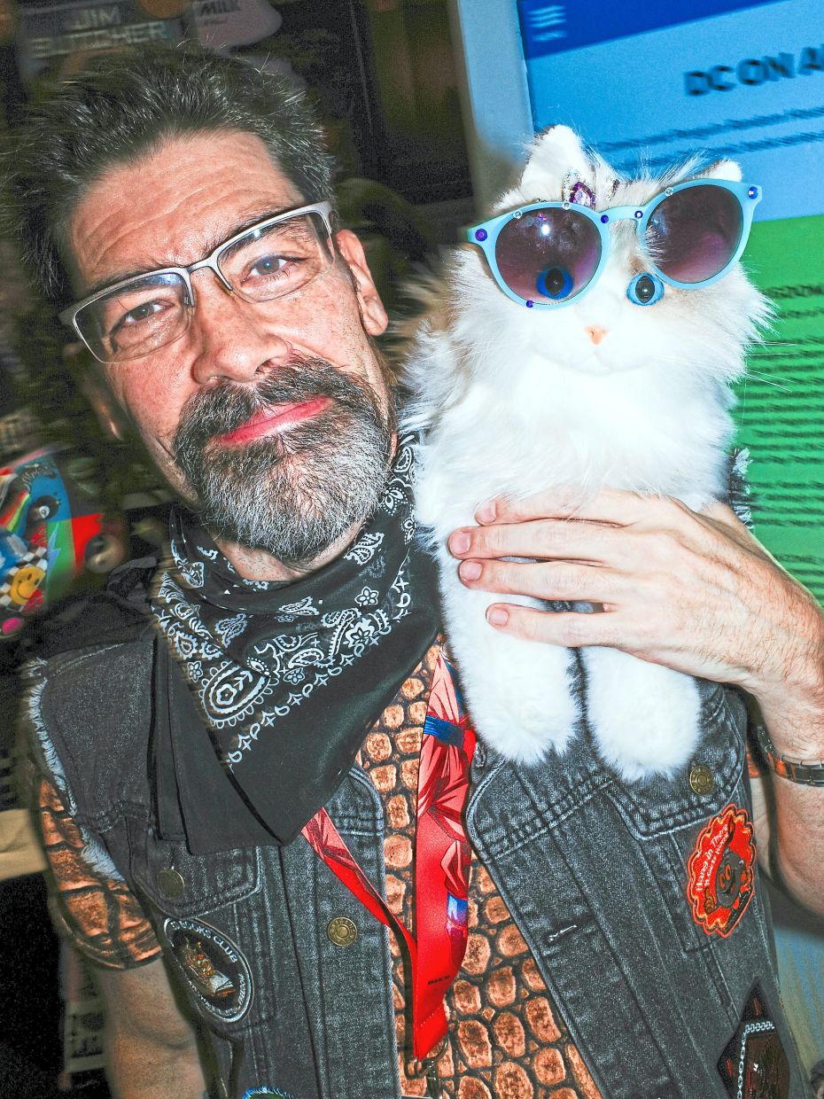 Fan Jason Bissey with a toy version of Princess Donut.