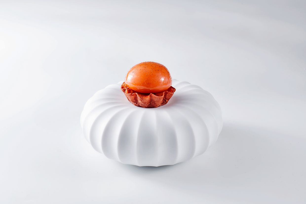 The sunchoke dessert highlights Depoortere's predilection for inserting vegetables in his sweet endings. — Molina KL