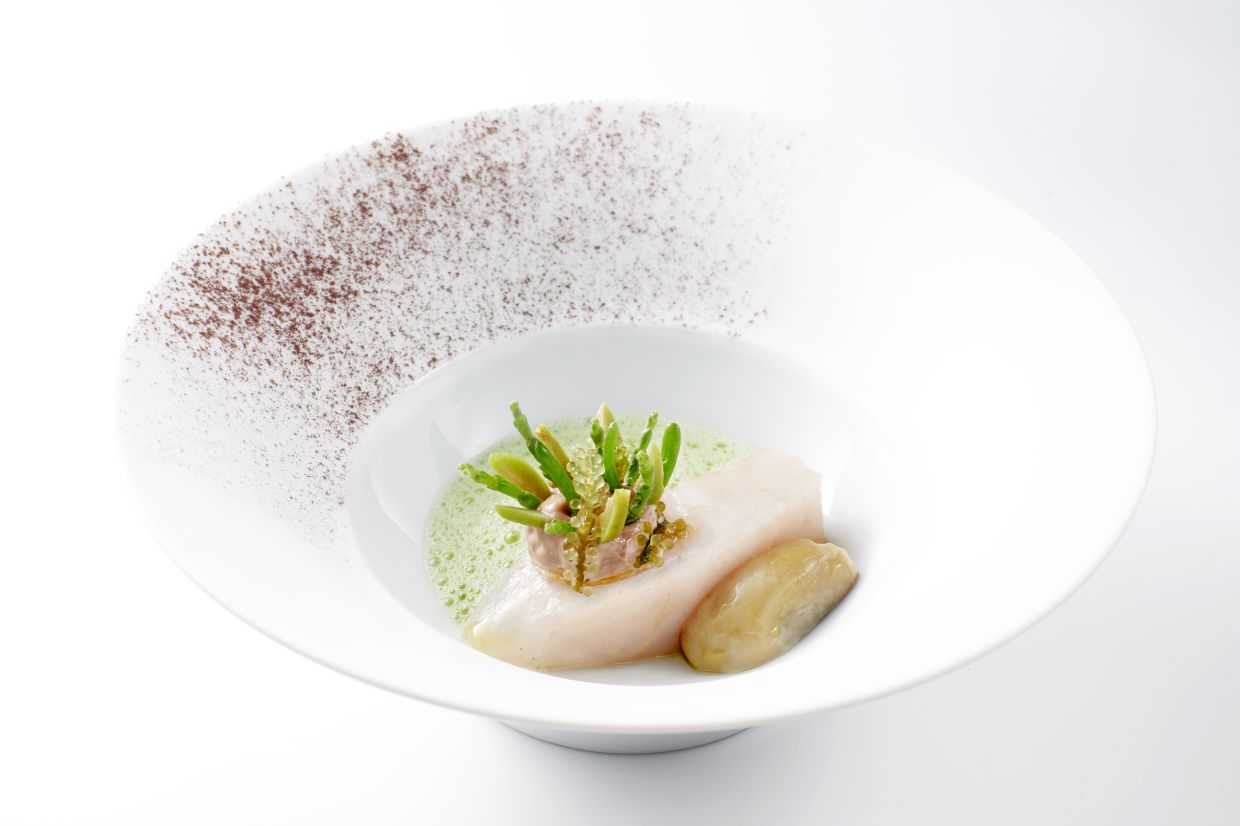 Grouper and cacao make for surprisingly amiable bedfellows in this show of creativity. — Molina KL