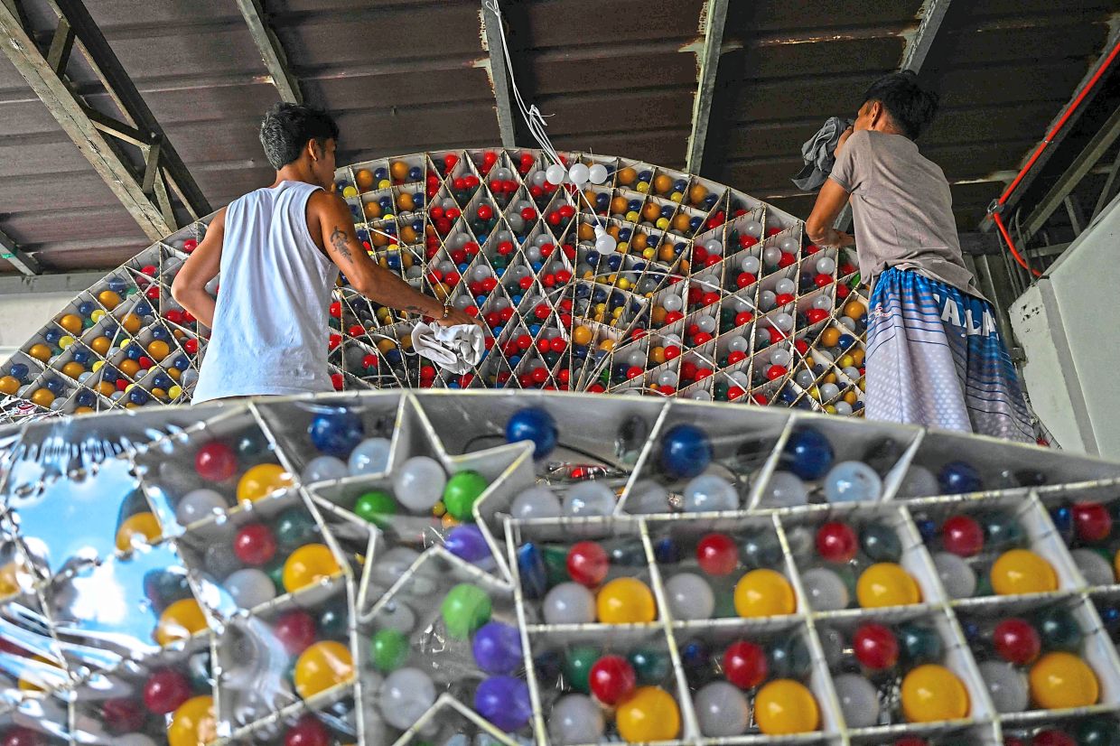 It takes a team of 20 over a three-month period to build a light display.