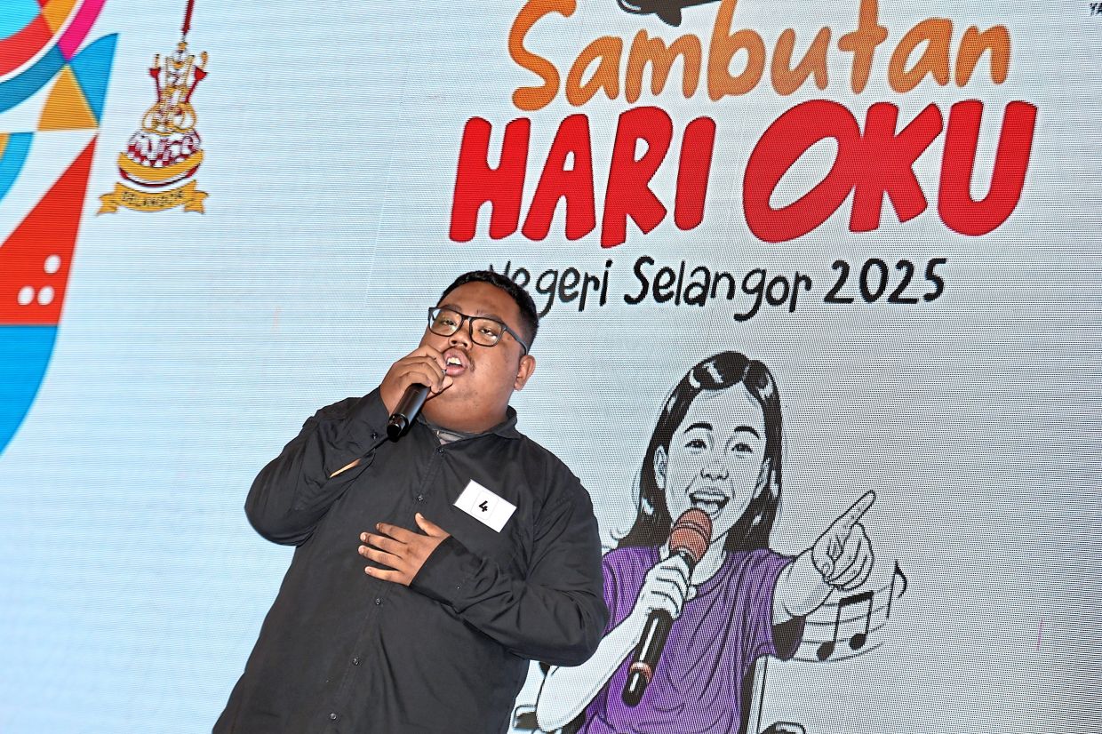 Activities during the celebration included a singing contest won by Mohammad Amir Khusairi, 20. — Photos: LEONG WAI YEE/The Star