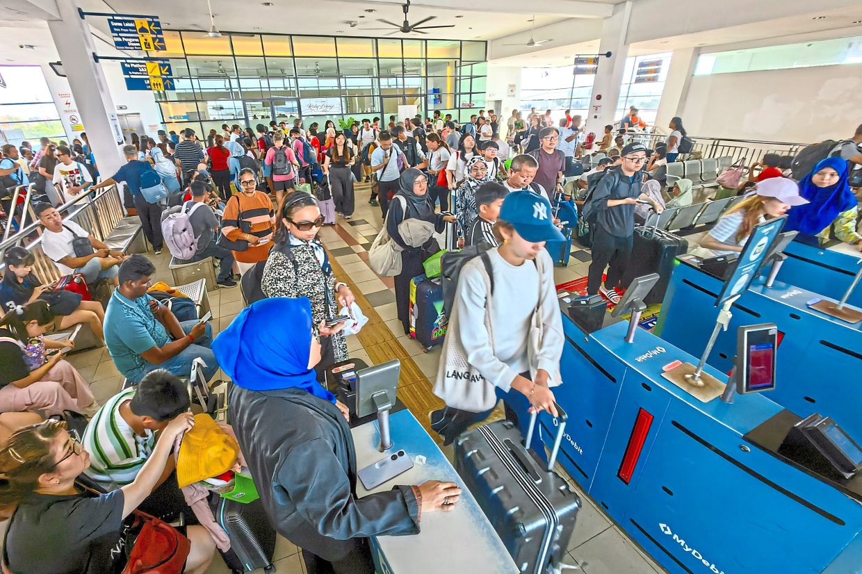 Penang clogged with people and cars