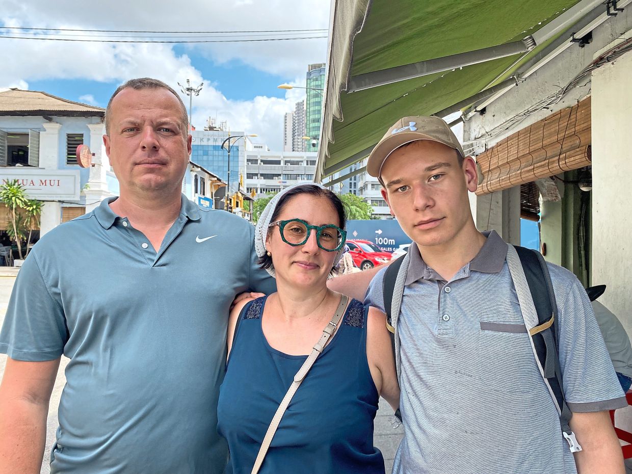 Orlova (centre) together with her husband and son, have their own traditions to celebrate the festive season. 