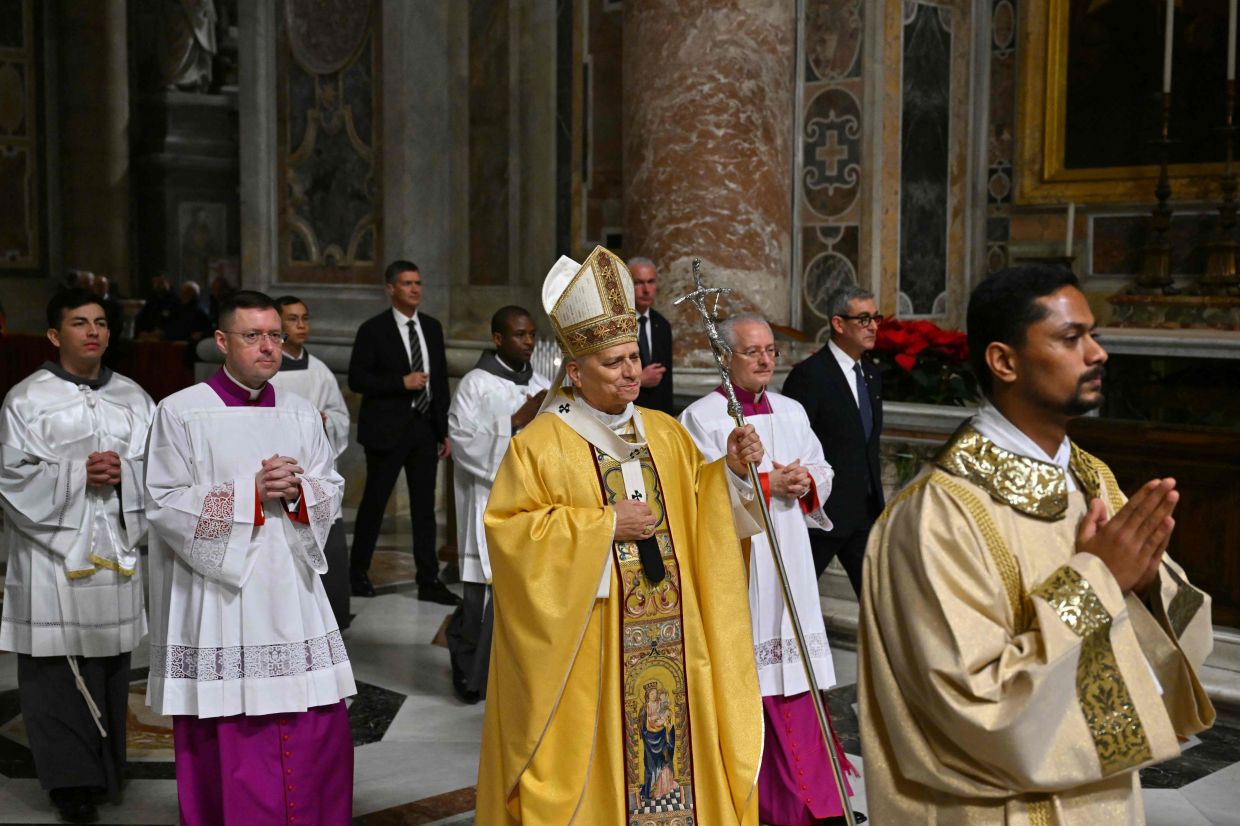 Pope calls for peace and compassion in first Christmas Mass